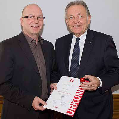  Handelszeichen in Gold